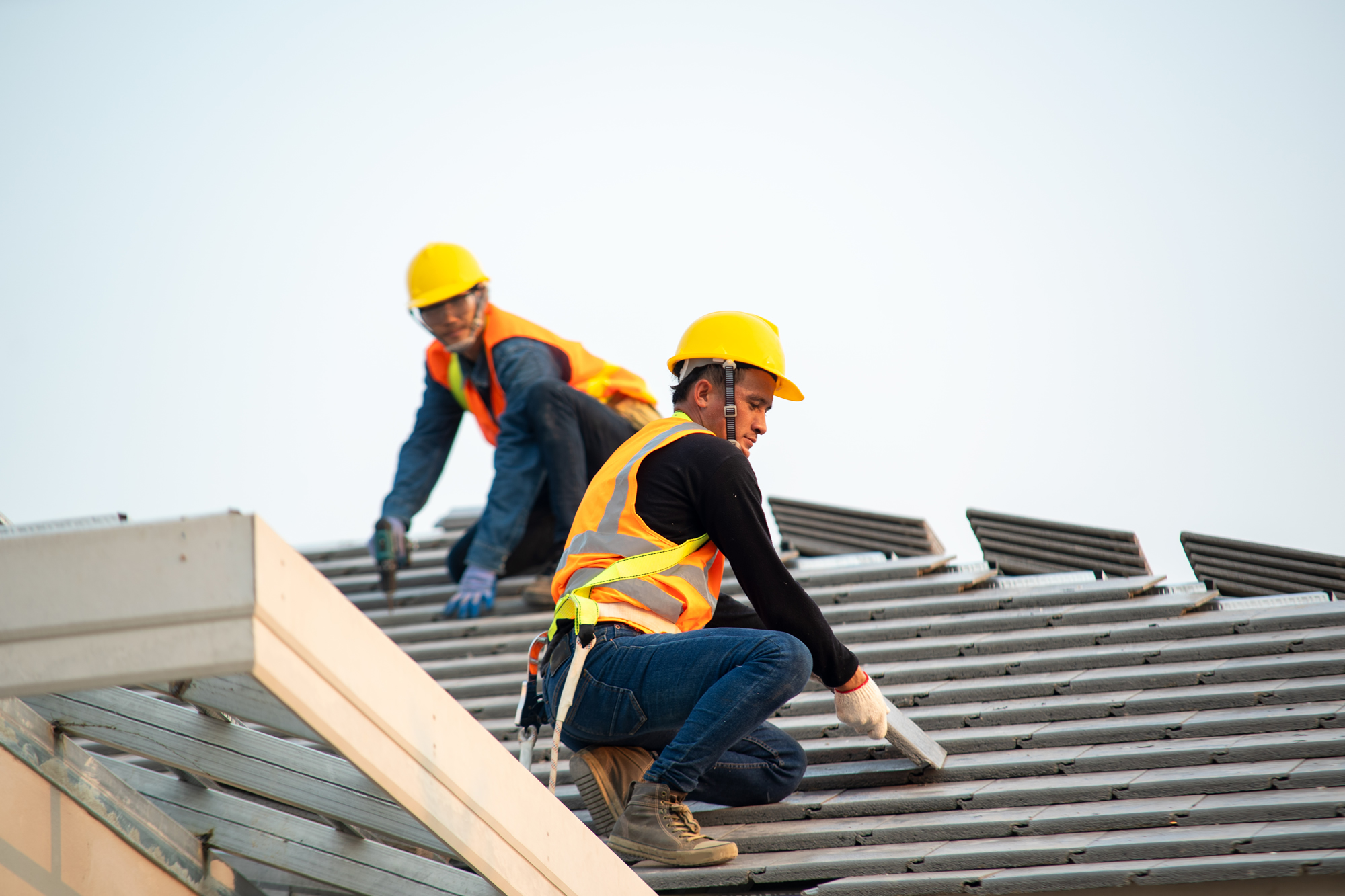 Two Roofers with hard hats